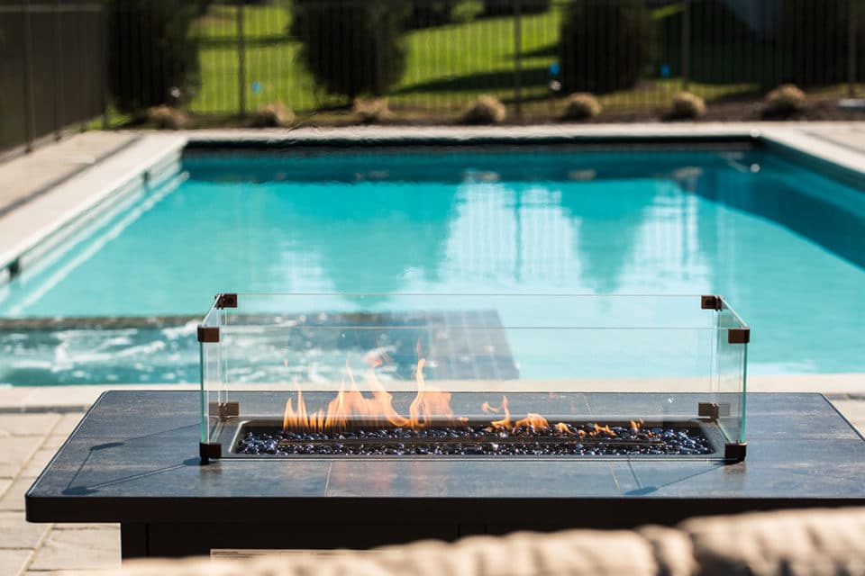 A table with a built in fire feature.