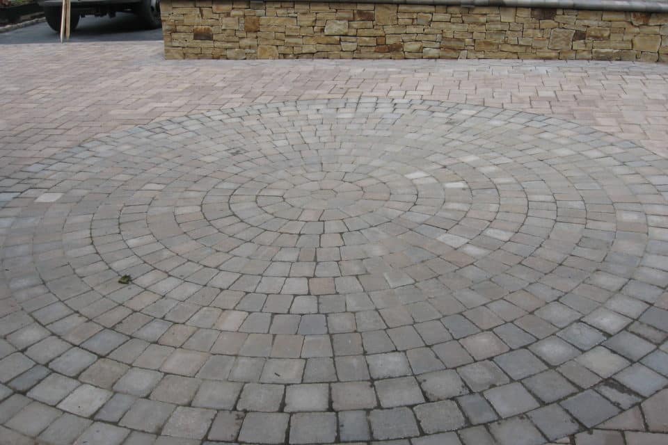 Stone brick driveway.